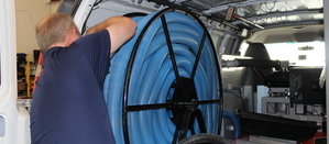 Technician Prepping Hoses For A Water Extraction